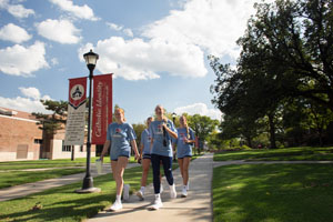 Female Students Walking on Newman University Campus